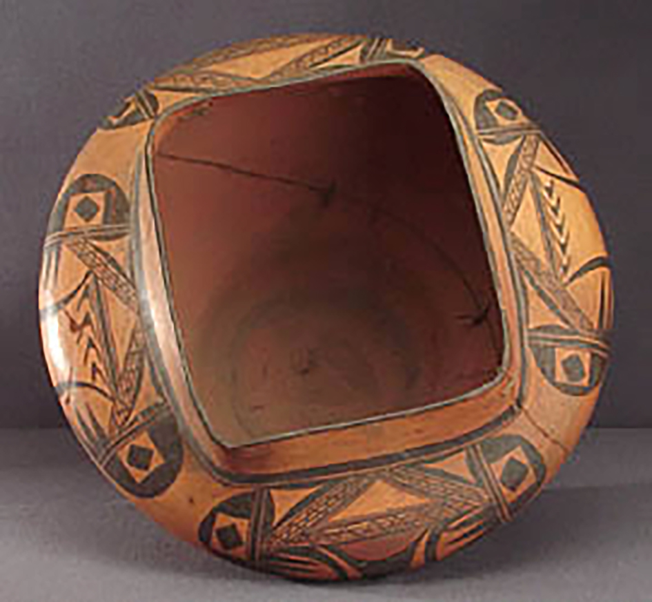 Top view, large square top polychrome olla, around 1920-30. GP52543.