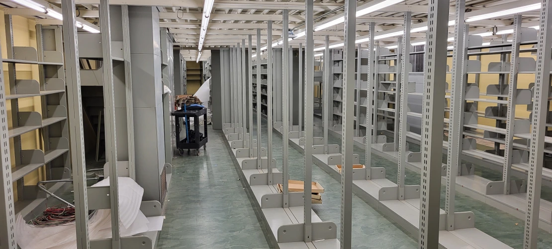 a view of room 328 with static metal shelving