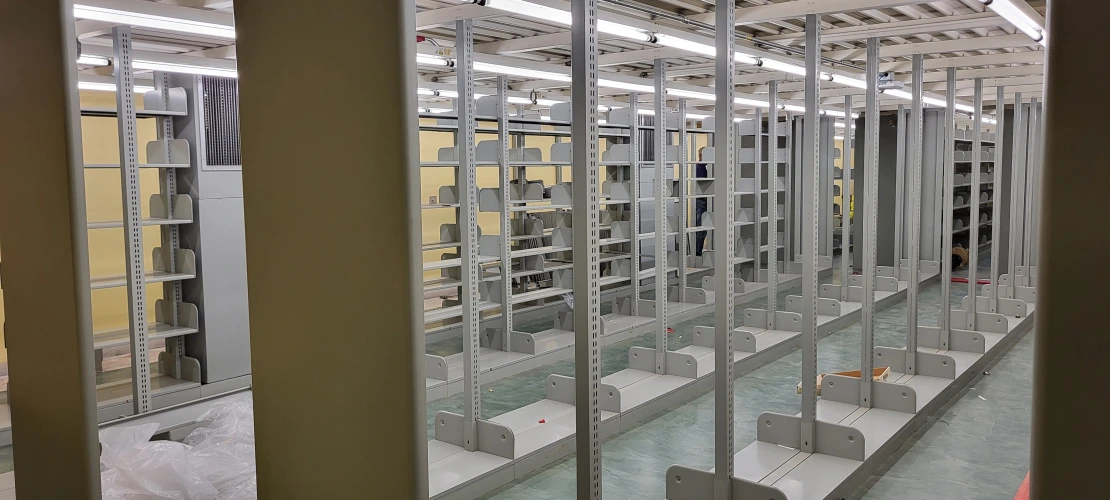 a view into room 328 with static metal shelving