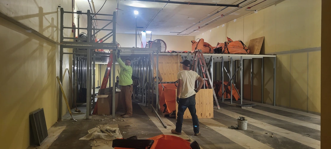 a view of room 328 during mezzanine floor demolition, showing the two levels of the room