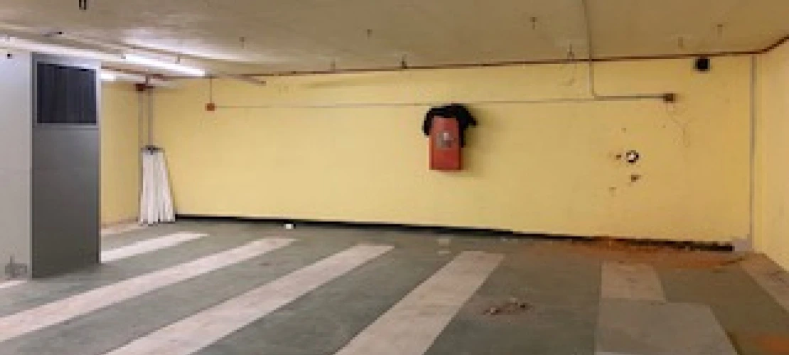 View of the mezzanine level of room 328 before demolition.