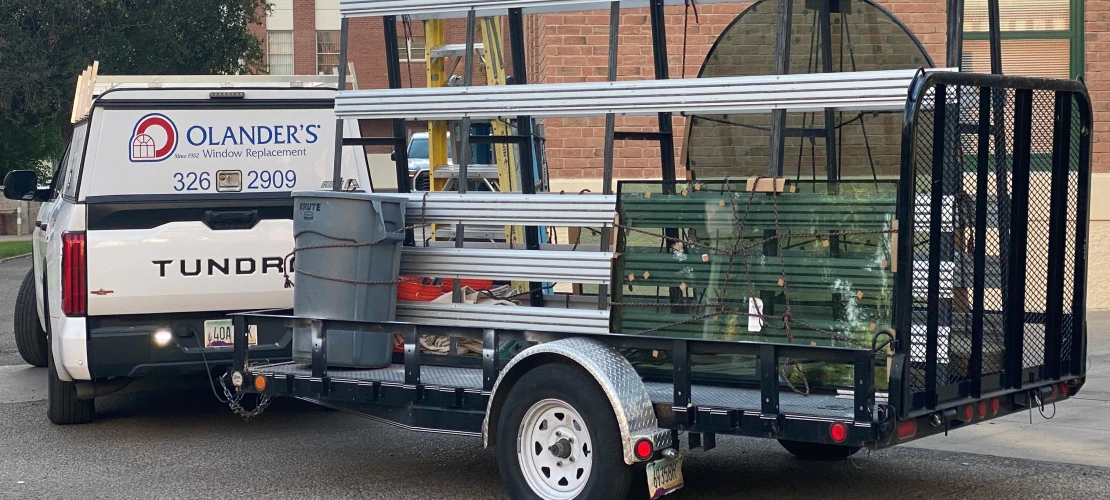 Olander's delivers new window glass to ASM.