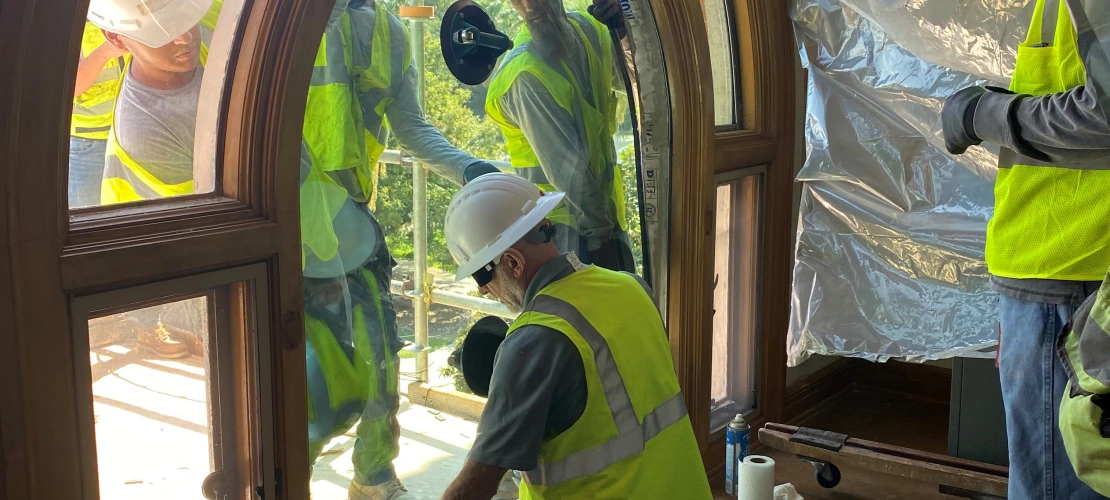 contractors replacing window glass in ASM's Laboratory of Zooarchaeology