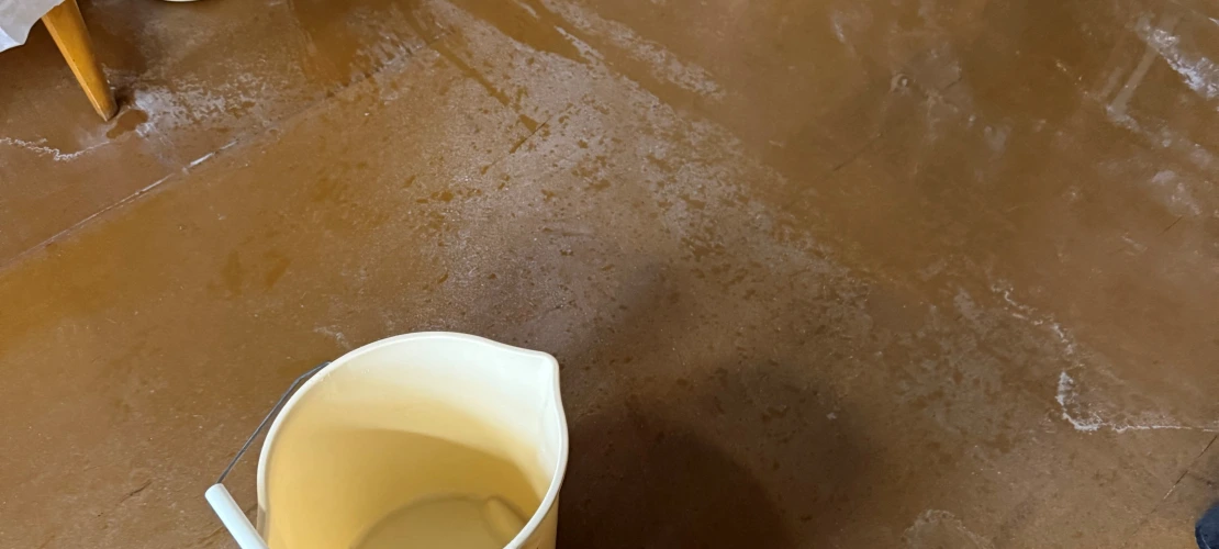 tide lines on the floor of the ASM library due to a flood