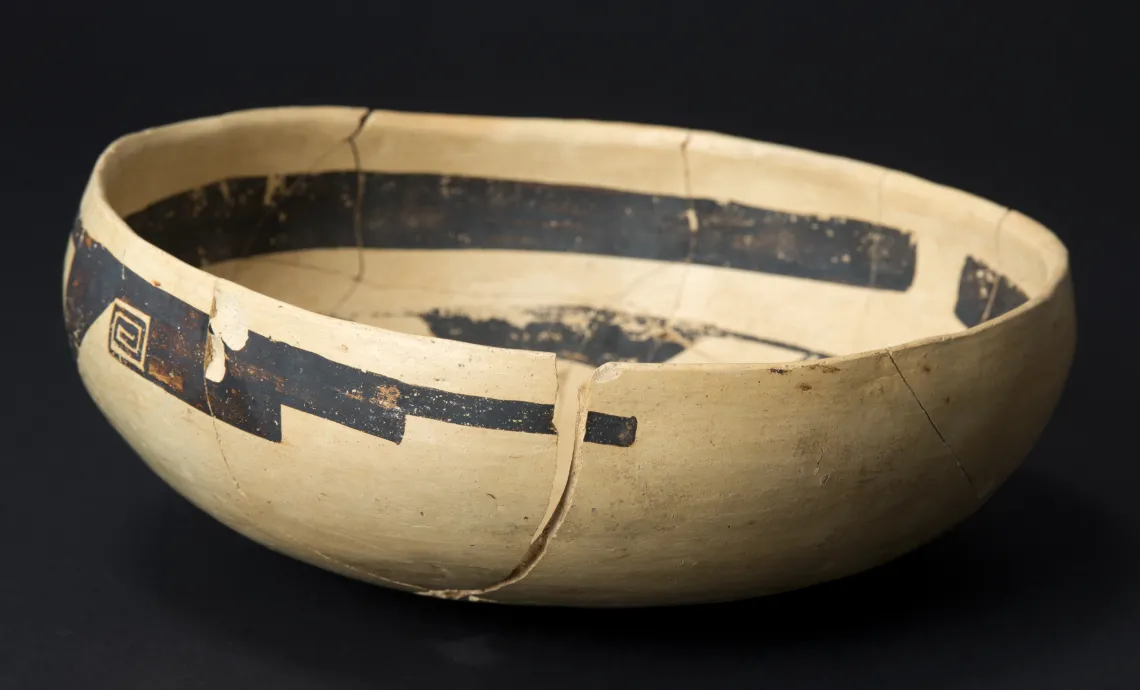 This is one of five purposely broken bowls found in the fill of a room at the ancestral Hopi pueblo called Homol'ovi I