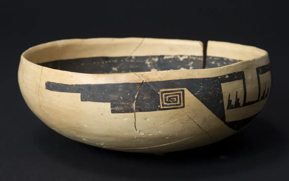 This is one of five purposely broken bowls found in the fill of a room at the ancestral Hopi pueblo called Homol'ovi I