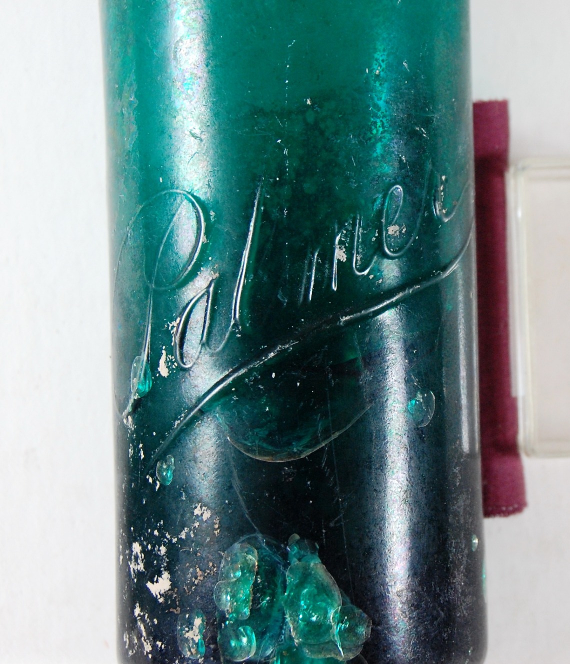 Green glass Palmer’s bottle