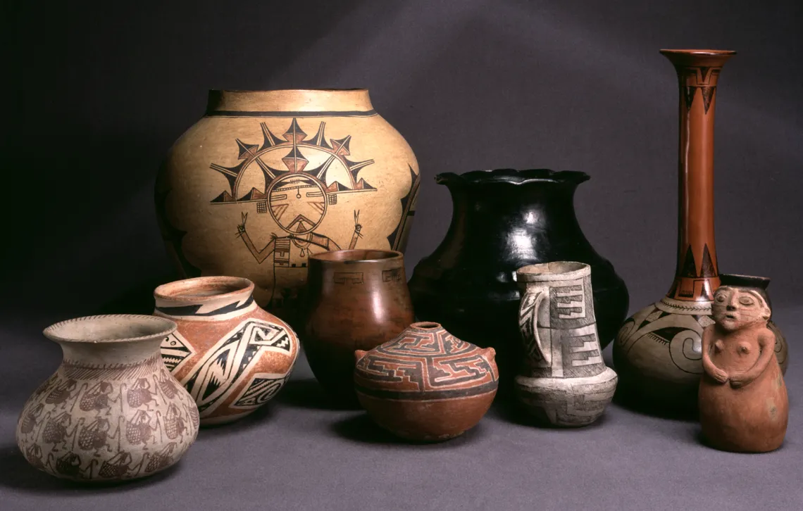 an assortment of southwestern Native pottery on a field of gray 