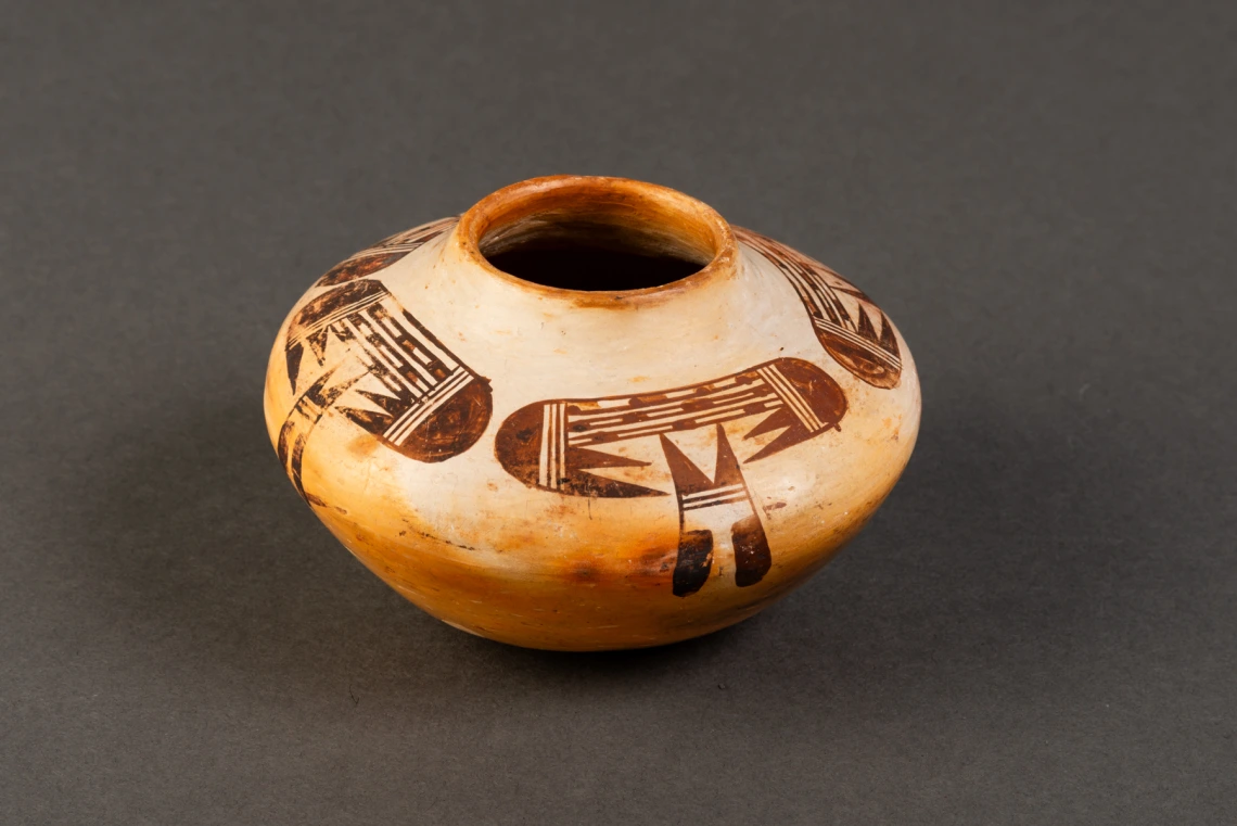 small polychrome jar with bird-wing design