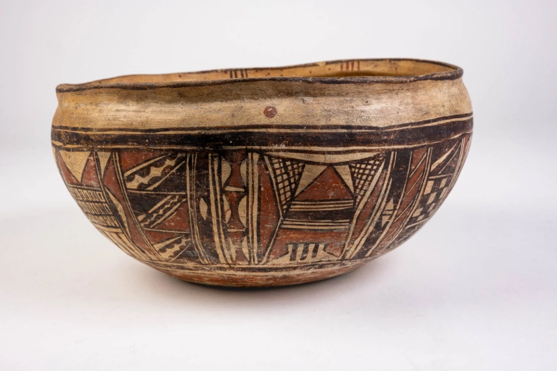 a side view of a polychrome bowl