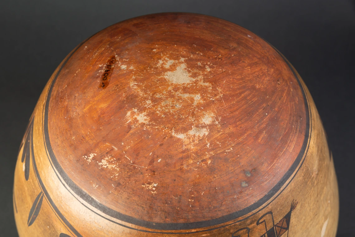 A view of the bottom of a large Hopi ceramic jar.