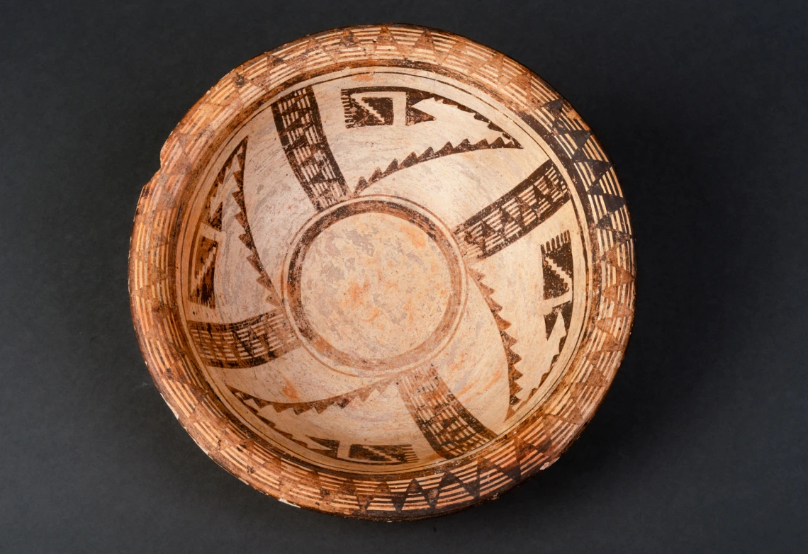  a polychrome bowl with everted rim