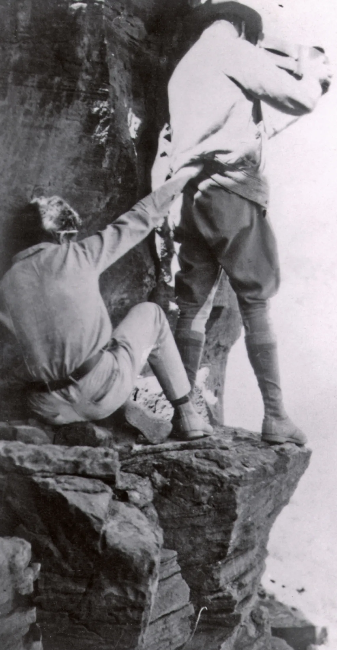 Emil W. Haury photographs Canyon Creek Ruin from across the canyon