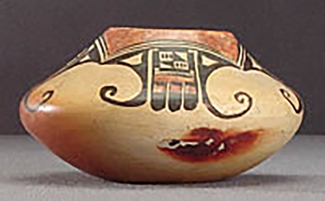 Side view, small polychrome jar with abstract eagle motifs, around 1900-1910. (ASM 80-45-2).