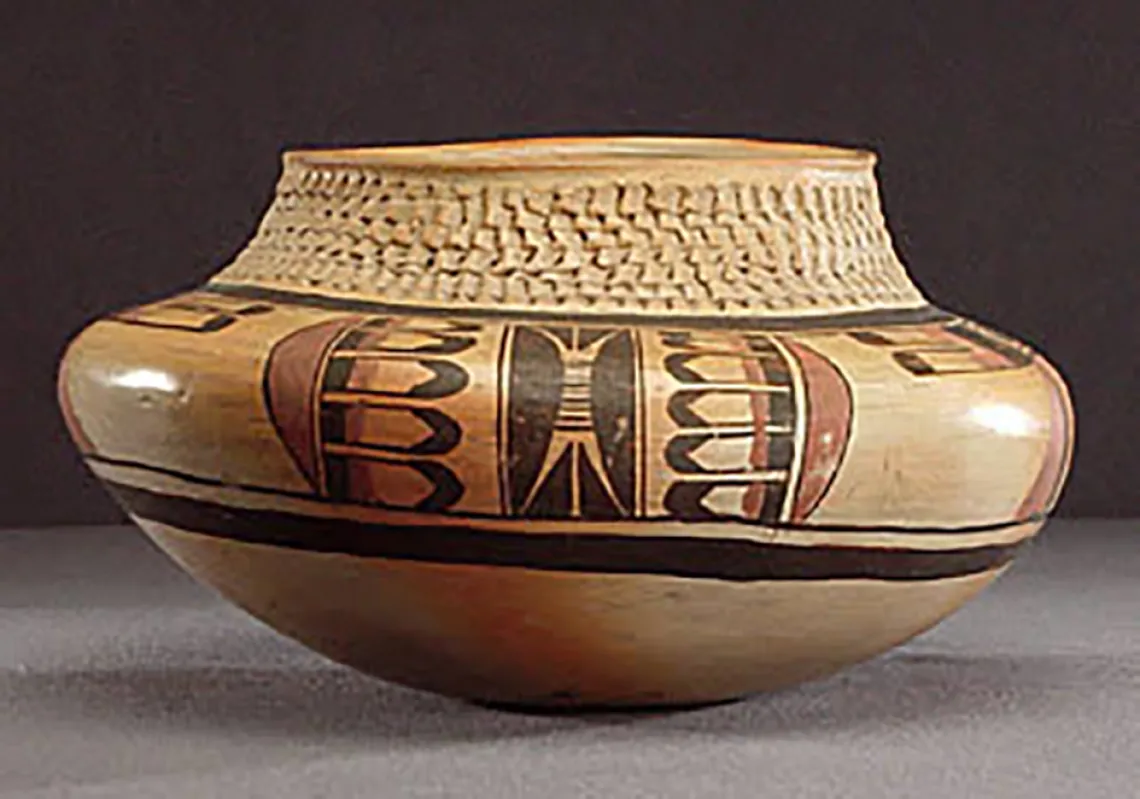 Side view, polychrome jar with corrugated neck, around 1920. ASM E-2273.