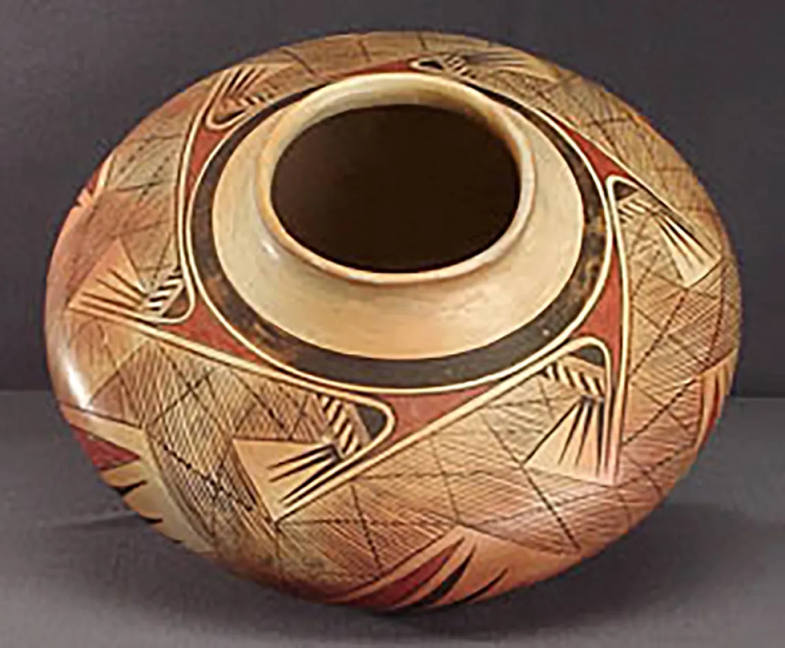 Oblique view, polychrome jar with migration design, around 1930. GP52534.