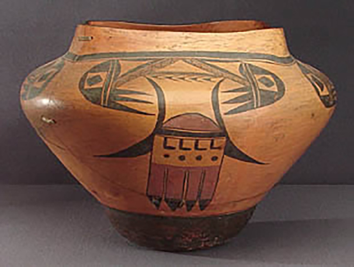 Side view, large square top polychrome olla, around 1920-30. GP52543.