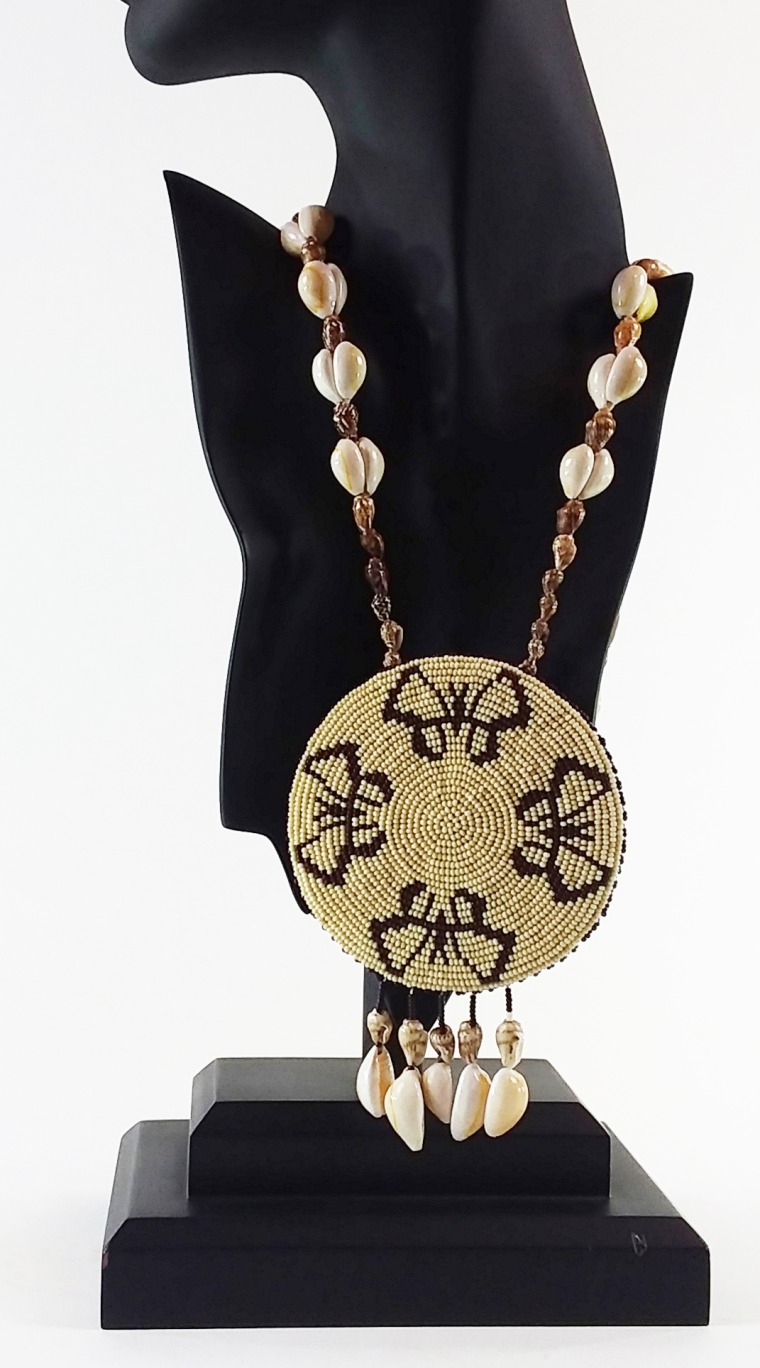 backet and shell necklace with butterfly motif