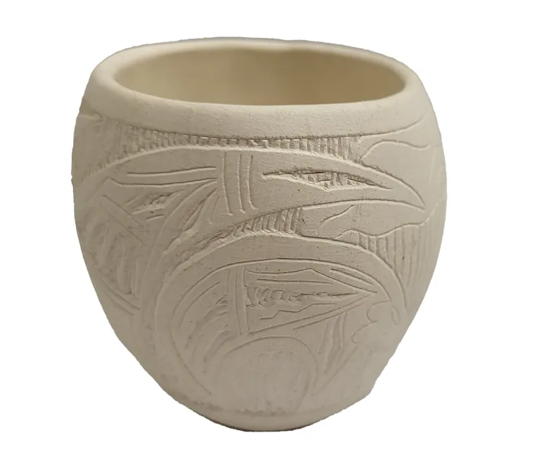 small white pot with incised designs