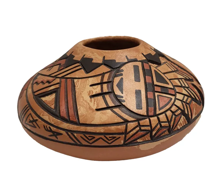 etched and painted seed jar with kachina face