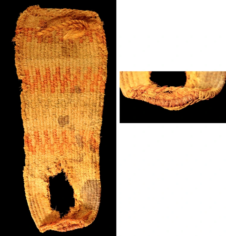 The top of the sandal has several stripes made of a zig-zagging red design against the ochre background color.