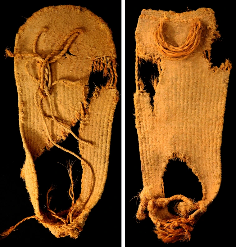 Two sandals side by side. Left: The sandal has a round toe shape and a puckered heel shape. There is a large hole under the heel and ball of the foot, but the edges of the sandal and the toe remain intact. Right: The sandal has a scalloped toe shape and a puckered heel shape. There is a large hole in the heel of the sandal and two smaller holes on the ball and toe.