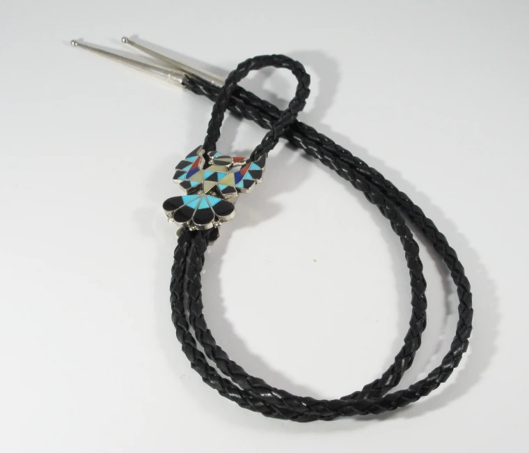 bola tie with thunderbird pendant