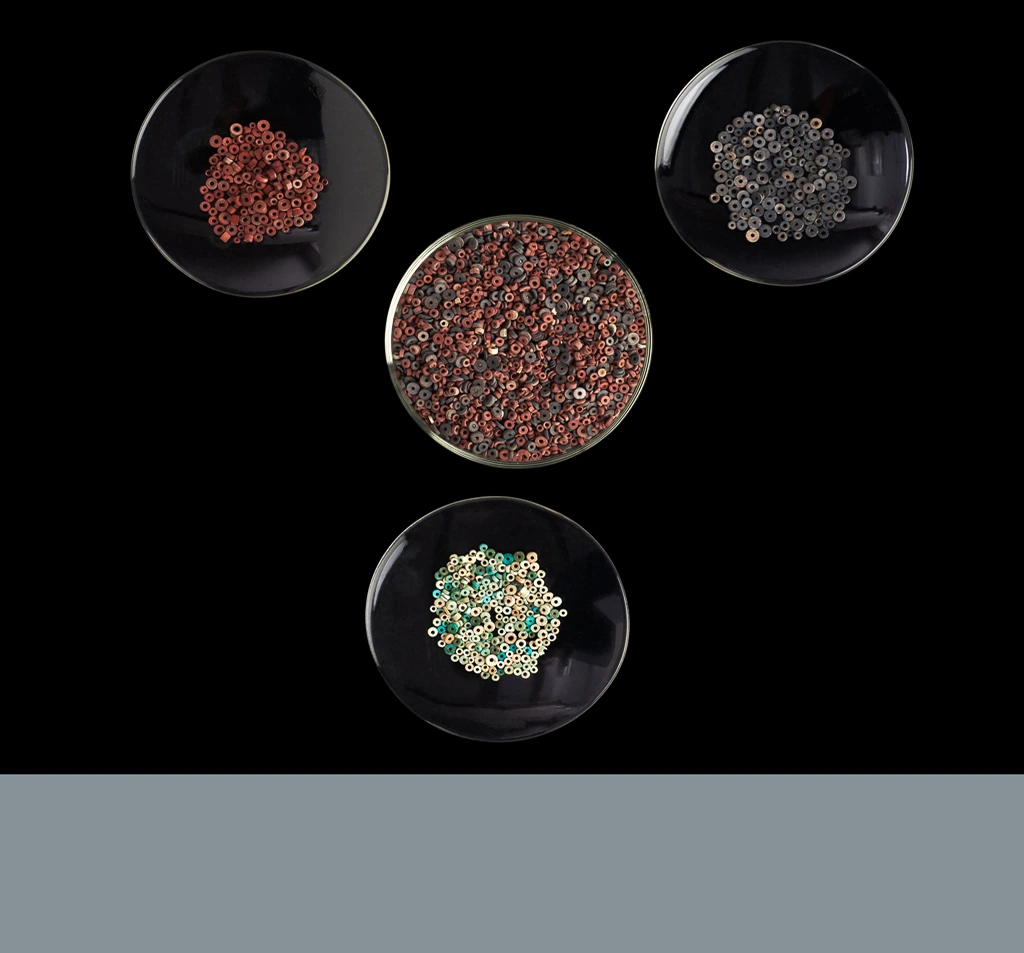 Sample of stone and shell disk beads.