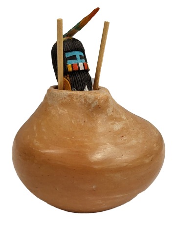 small Hopi pot with katsina emerging from it